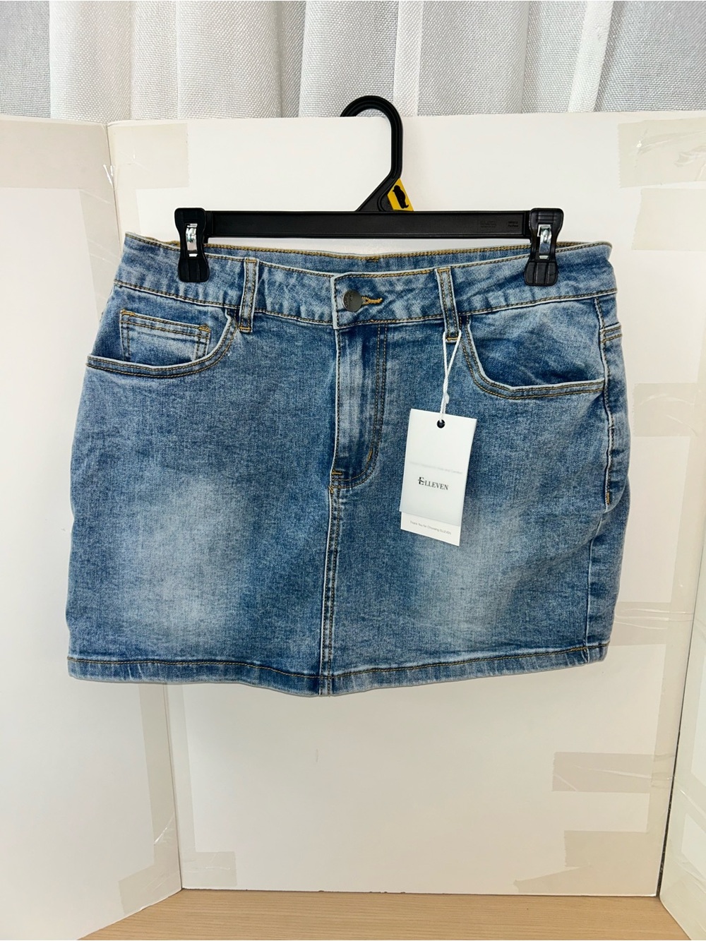 Denim Mini Skirt in Faded Blue - Brand:elleven